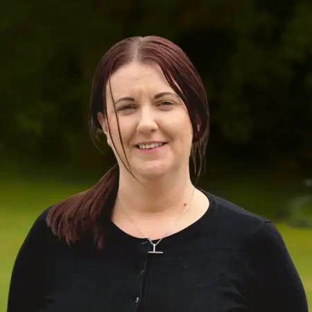Portrait photo of Sarah Mackin, Administration Assistant at Smarmore Castle, photo taken outside.