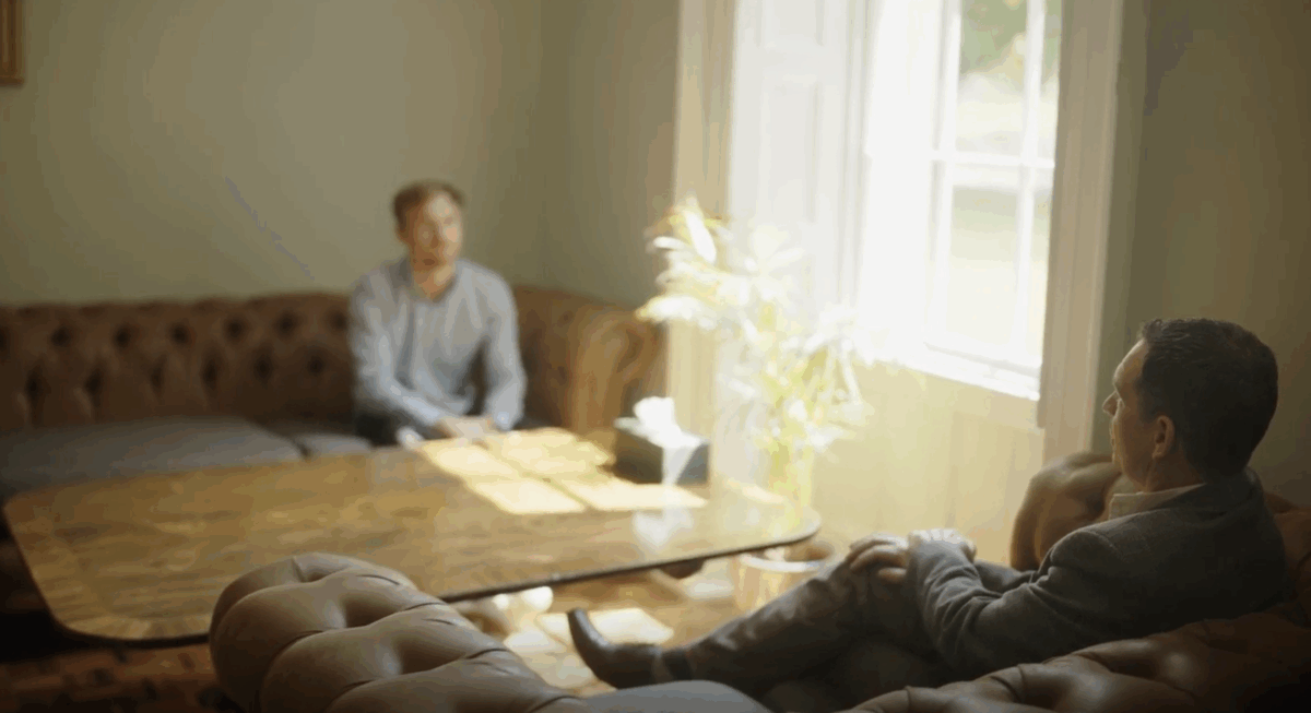 A person talking to a therapist about addiction treatment at Smarmore Castle