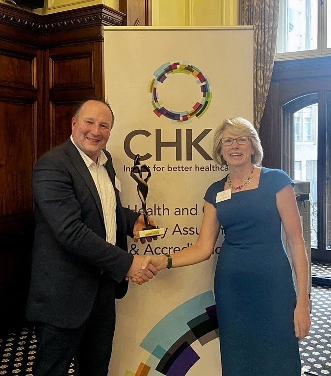 Keith Cassidy Receiving CHKS Quality Improvement Award in Manchester